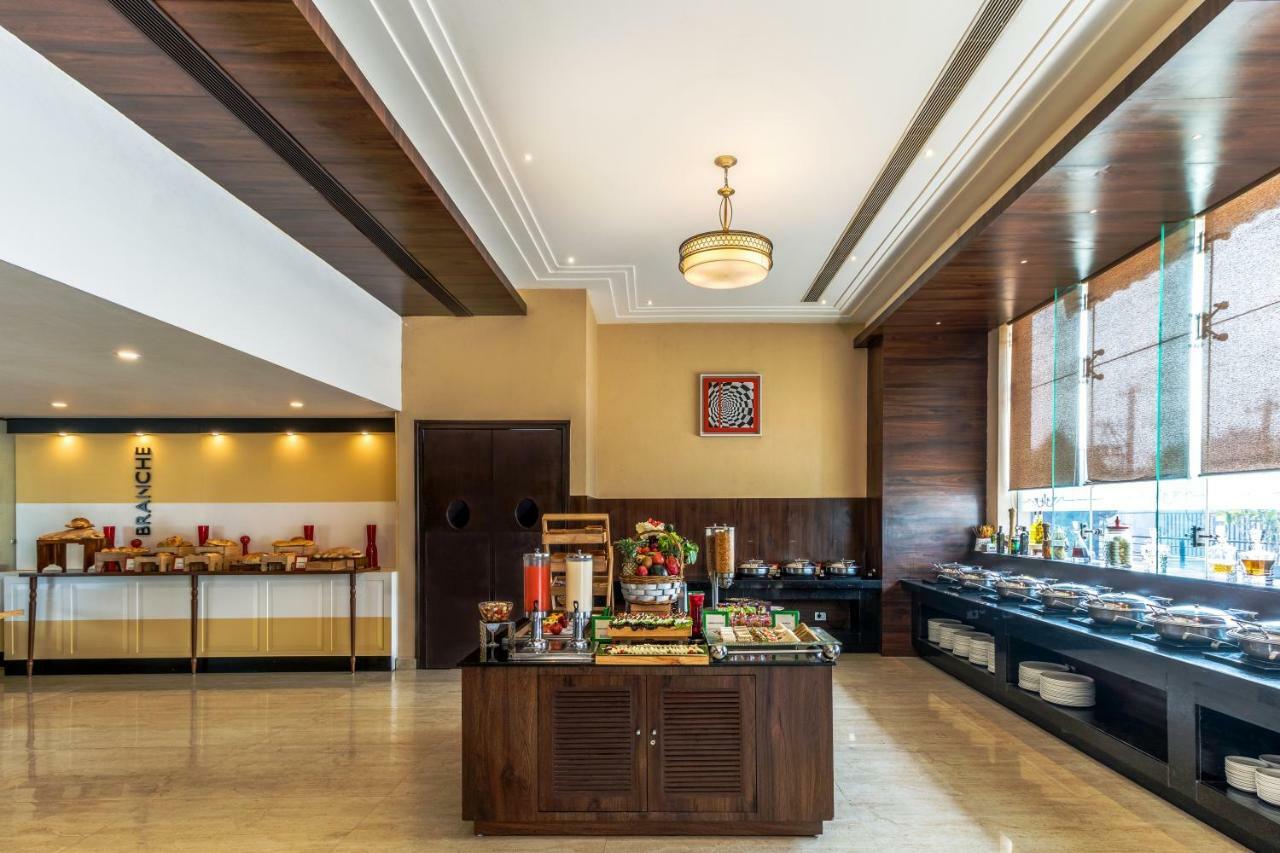 Golden Tulip Suites Gurgaon Eksteriør billede